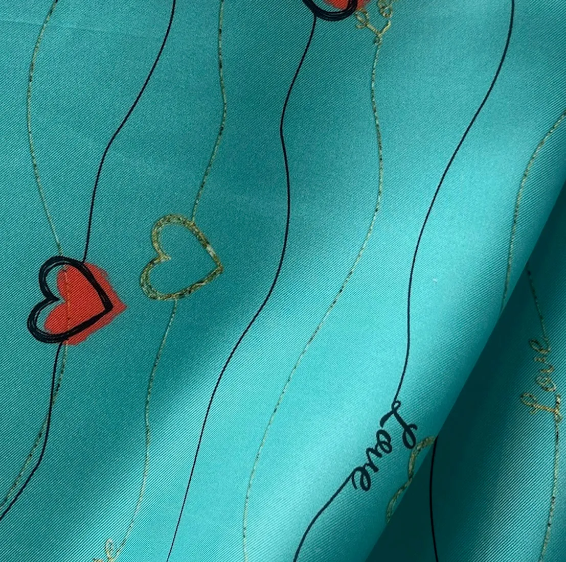 Love on a String on Turquoise Silk Twill (Made in Italy)