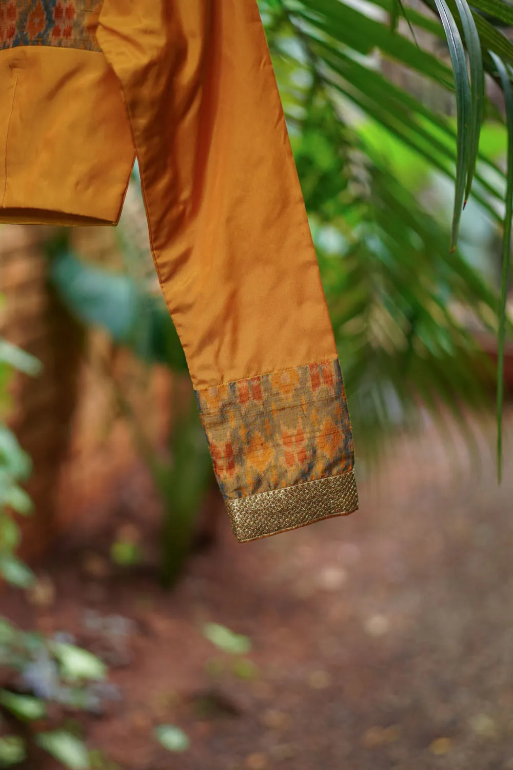 Mustard silk boatneck  blouse with pure rawsilk ikkat yoke